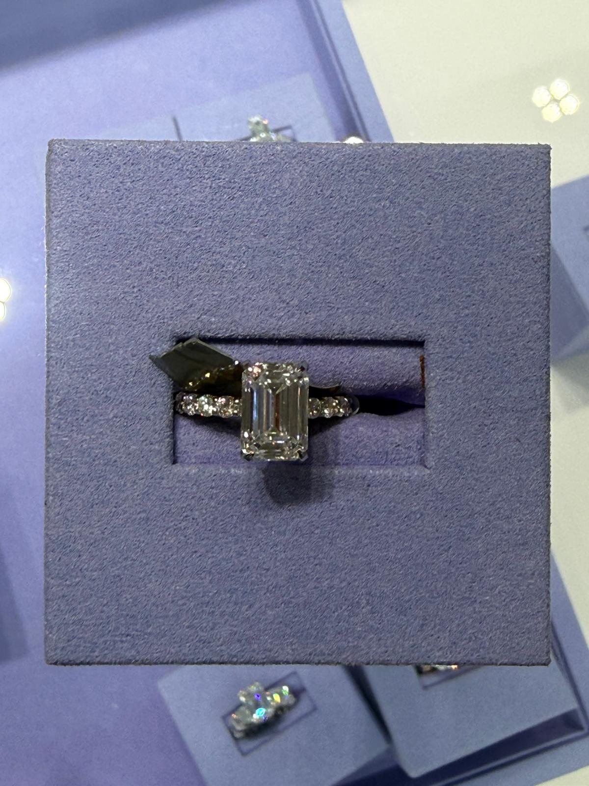 Rectangular center-stone ring with a stone-set band at BD Jewelrys