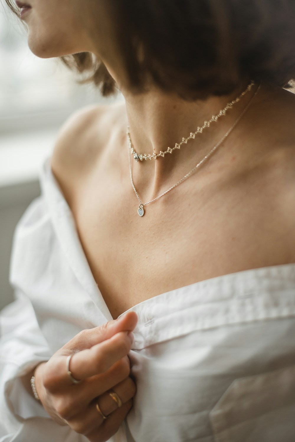 A selection of delicate gold jewelry — inspiration photograph